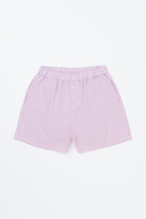 Avauma Sunny Stripe mom pants in lotus pink laid flat, showing soft cotton texture.